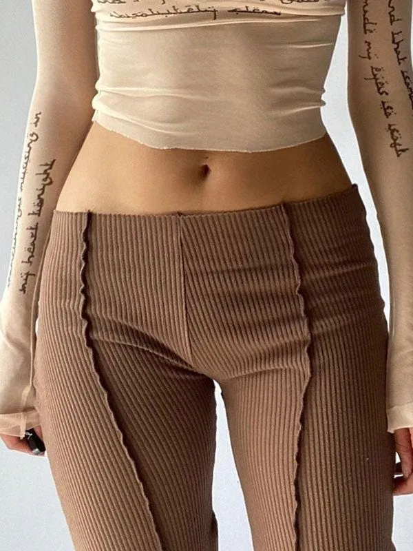 Brown vintage flared trousers with embroidered details