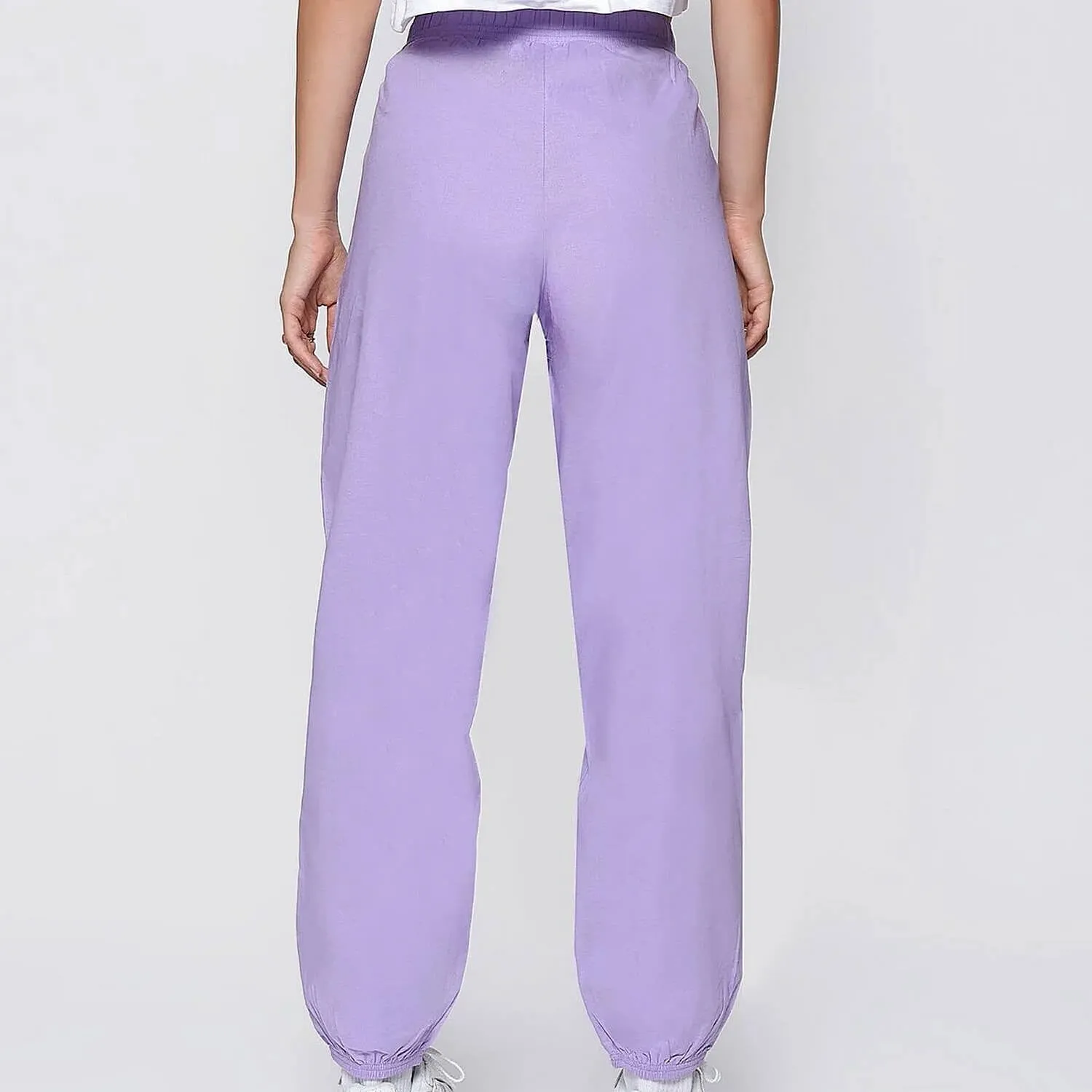 Dámske tepláky Champion wmn's Woven elastic cuff pants fialové