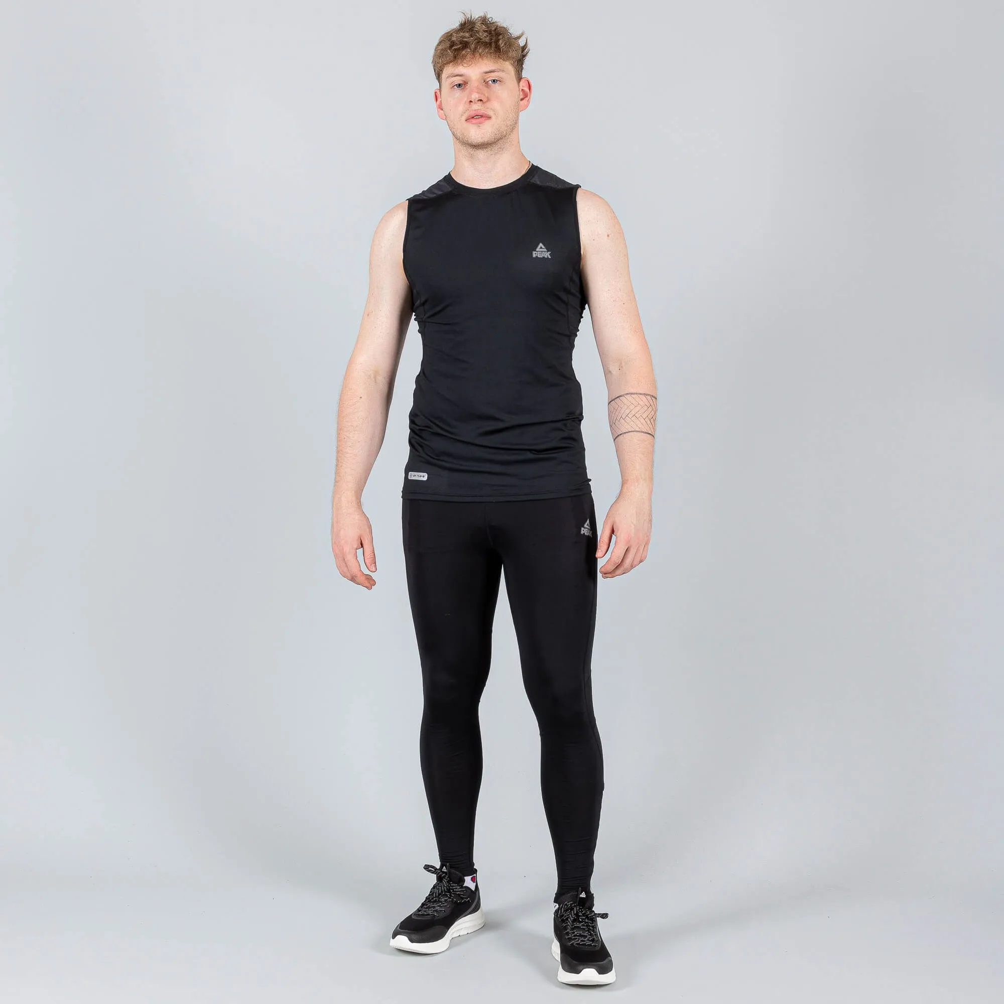 Pánske elastické bežecké nohavice Peak Elastic Pants čierne