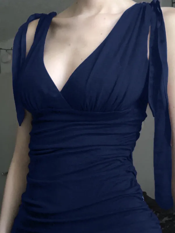 Sleeveless vintage top in plain purple with crossed V-neck