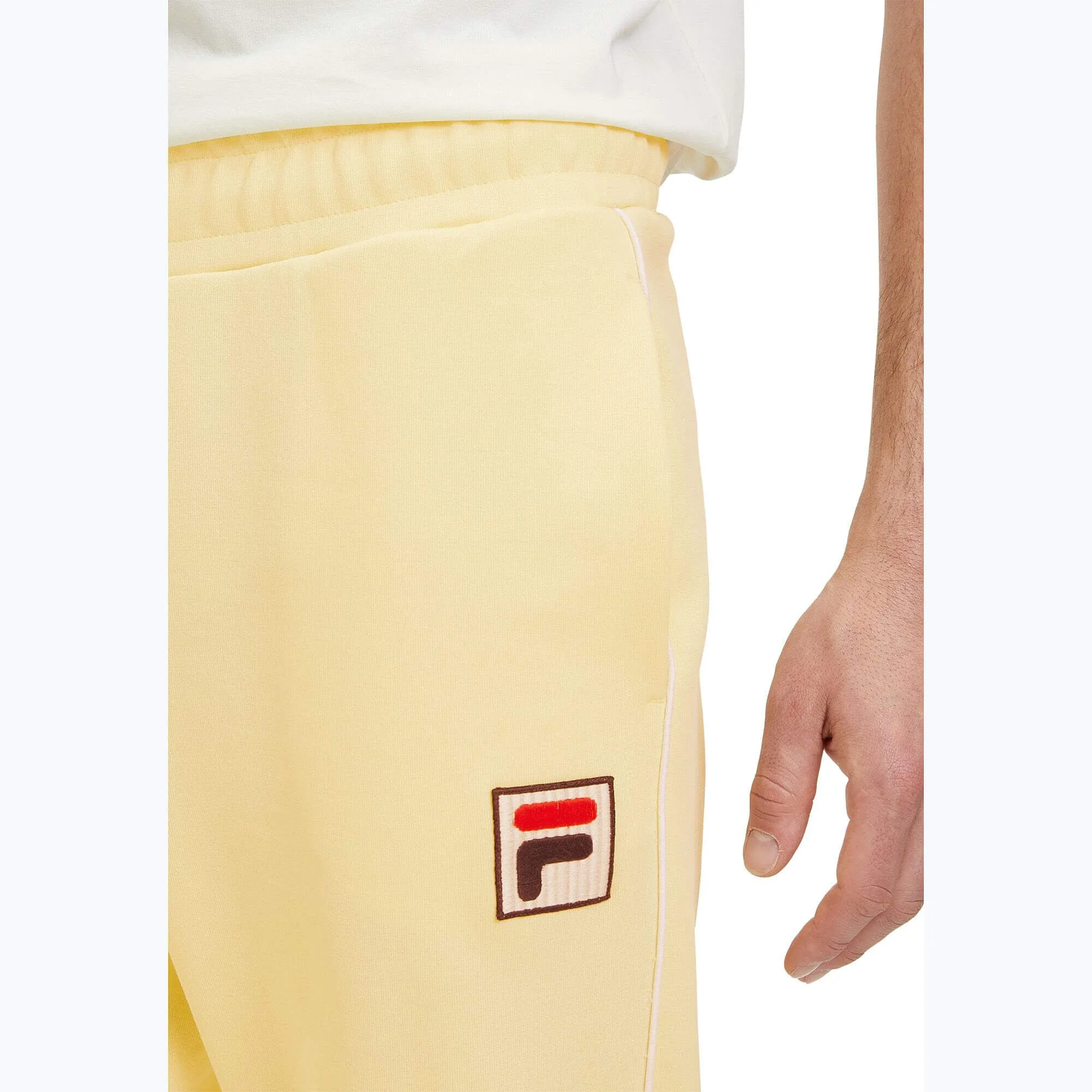 Tepláky Fila LINCOLN track pants žlté
