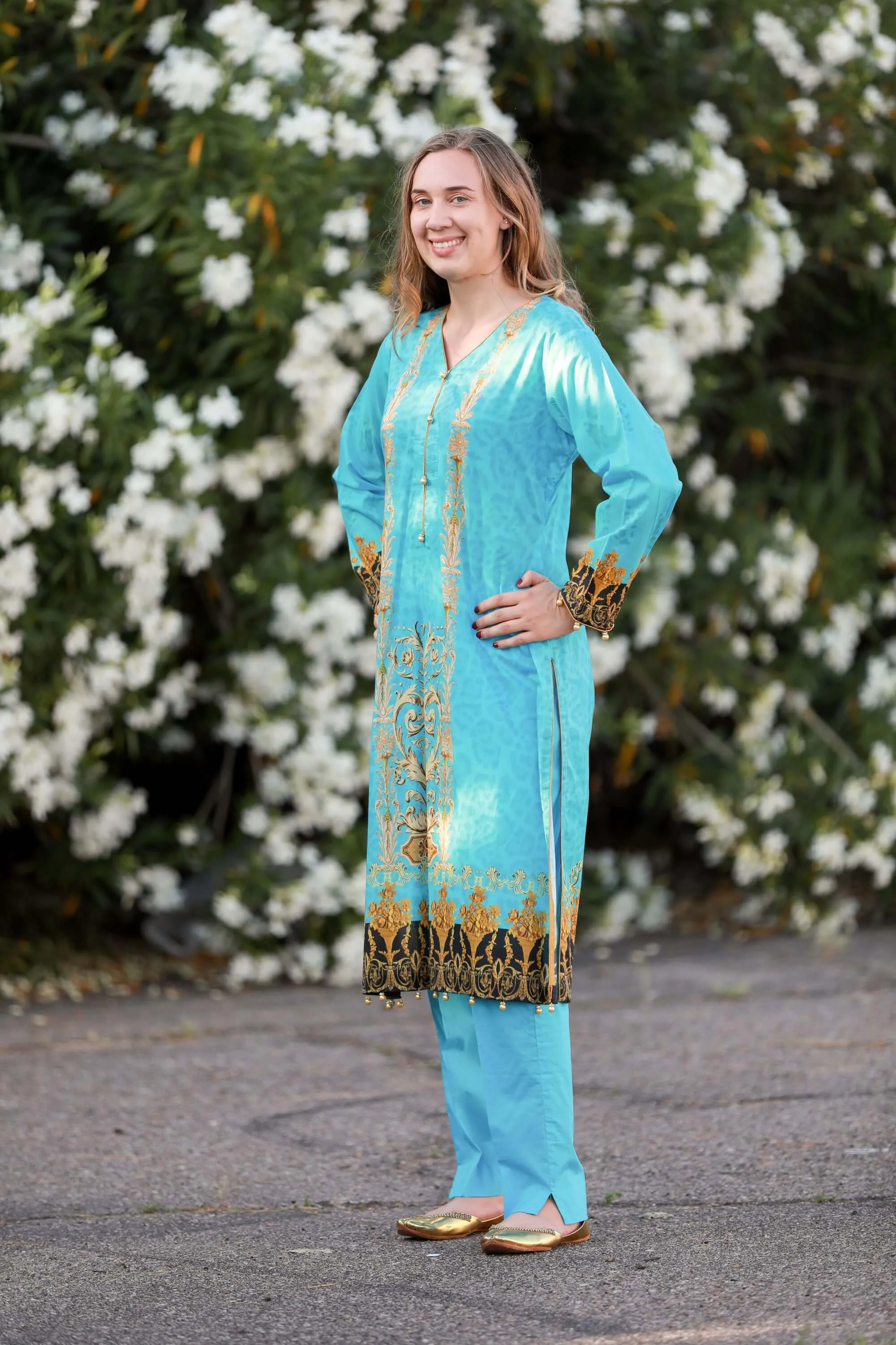 Turquoise Salwar Kameez With Print Design