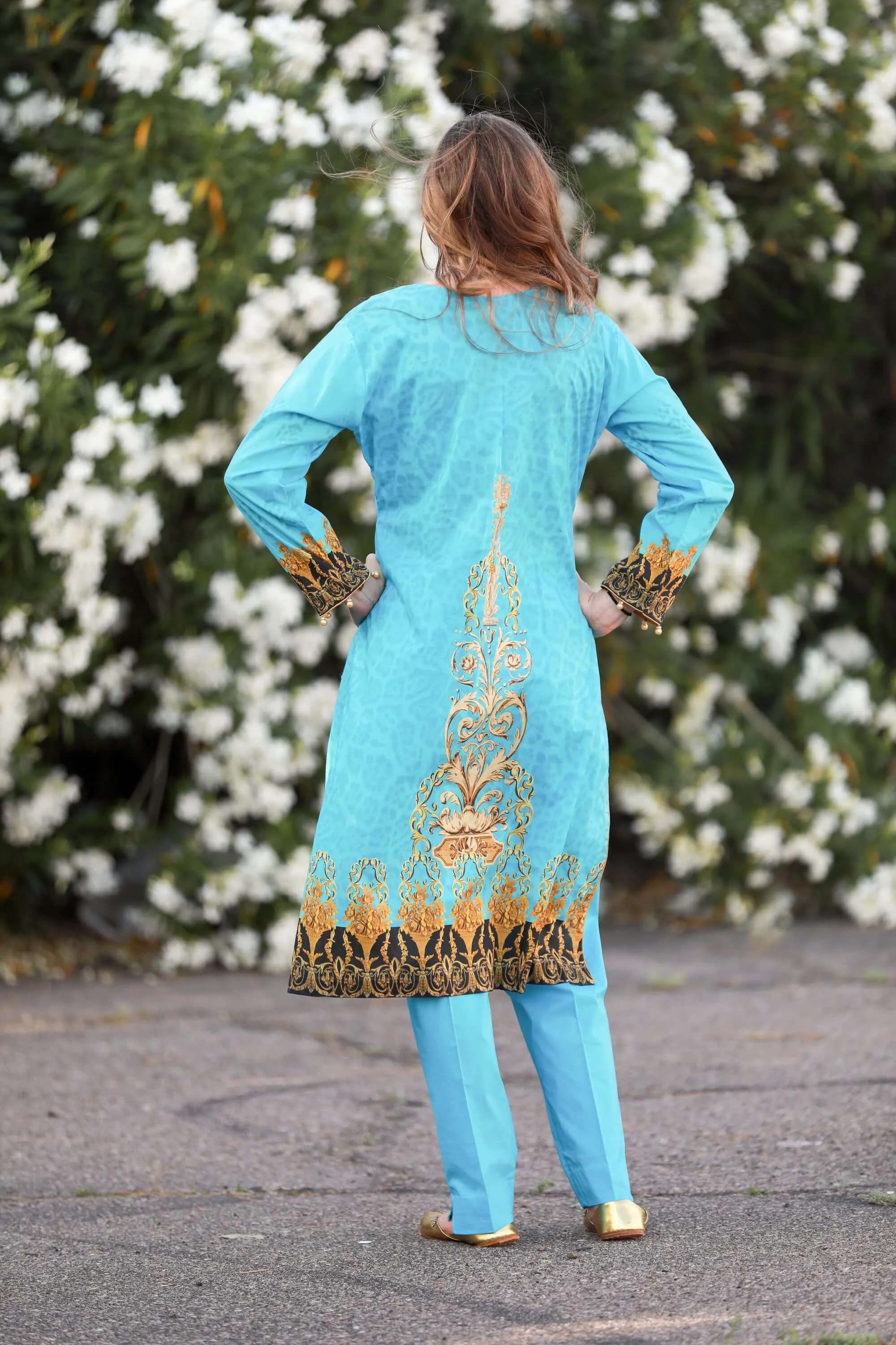 Turquoise Salwar Kameez With Print Design