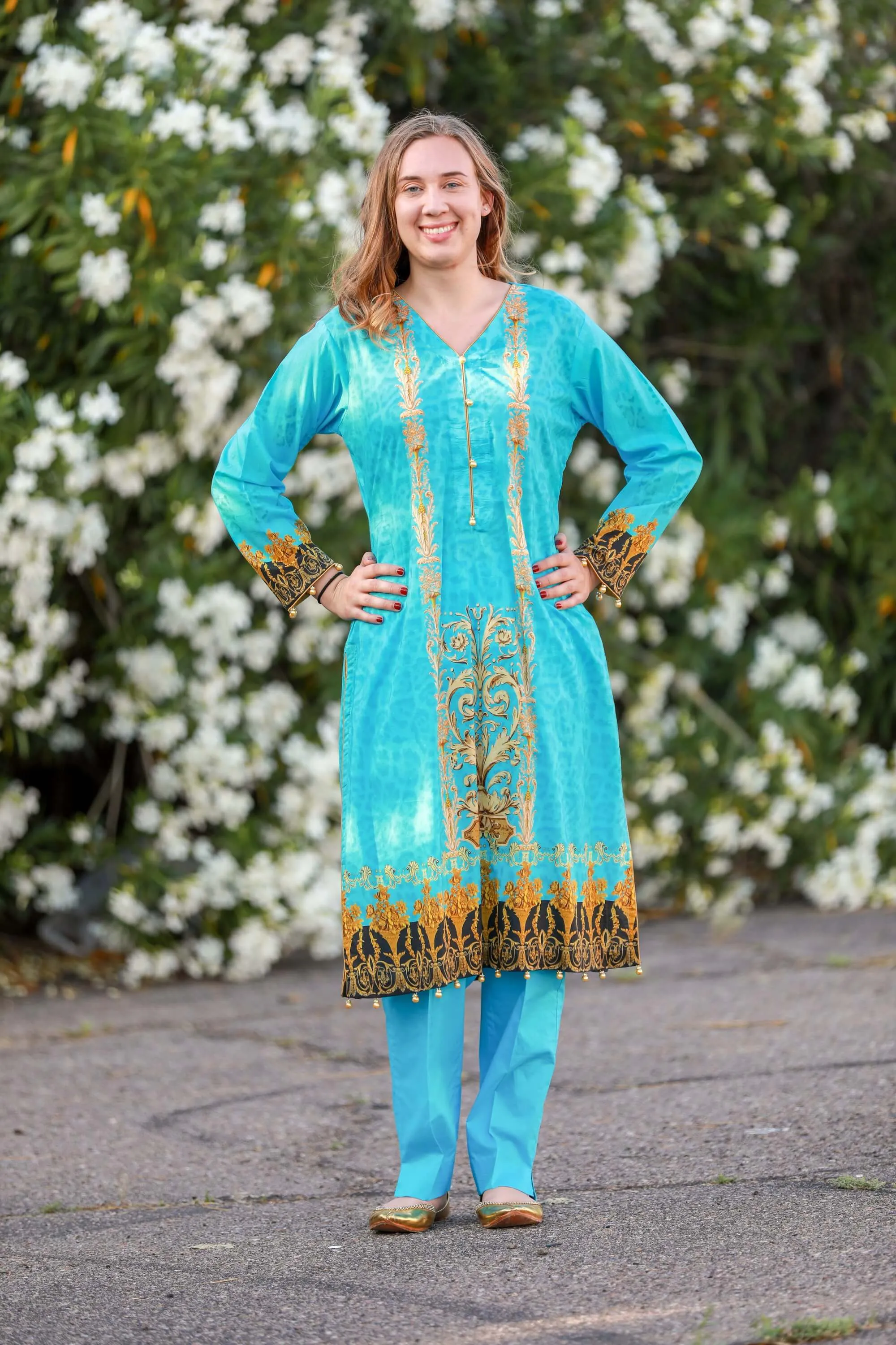 Turquoise Salwar Kameez With Print Design