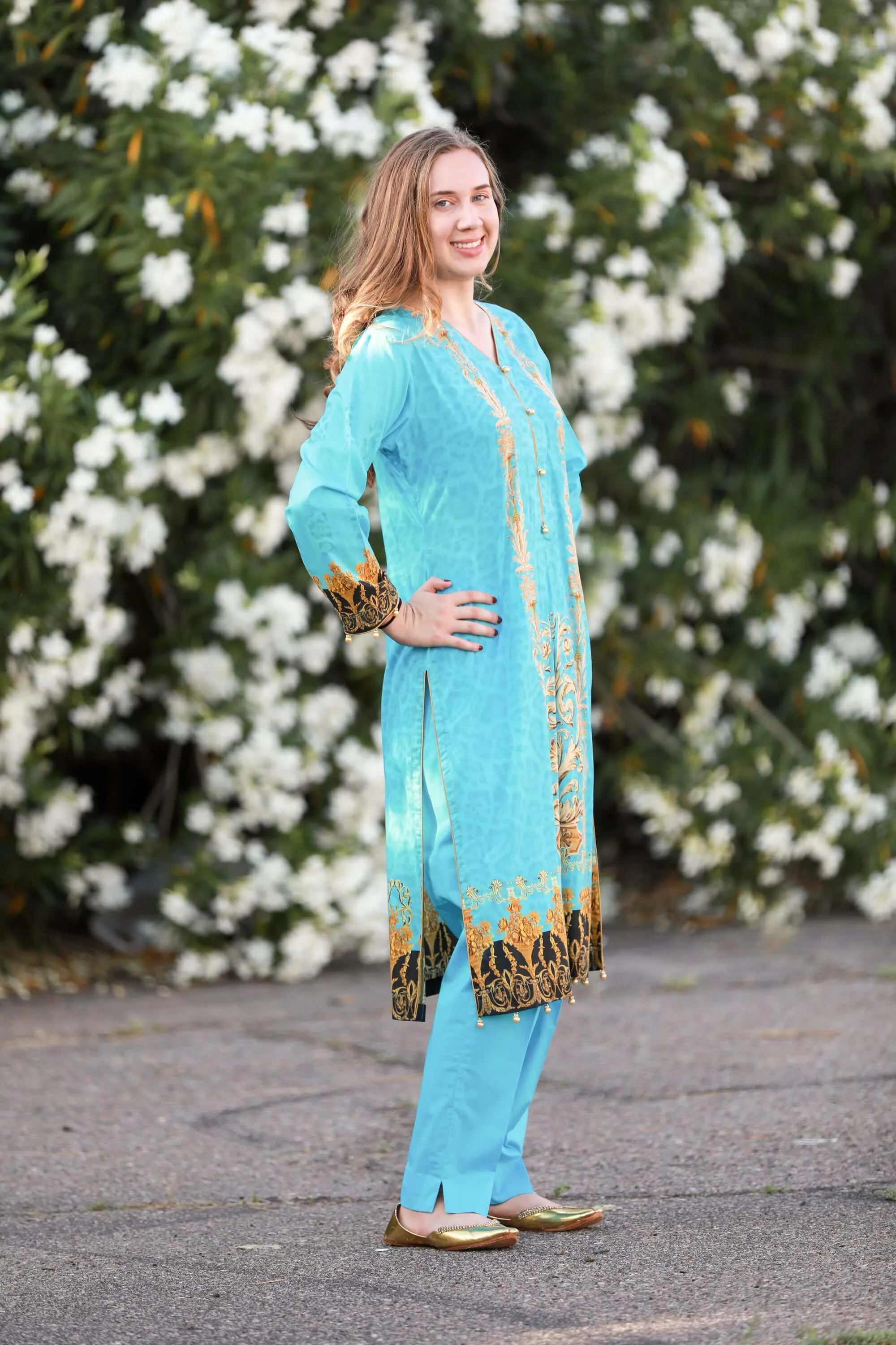 Turquoise Salwar Kameez With Print Design