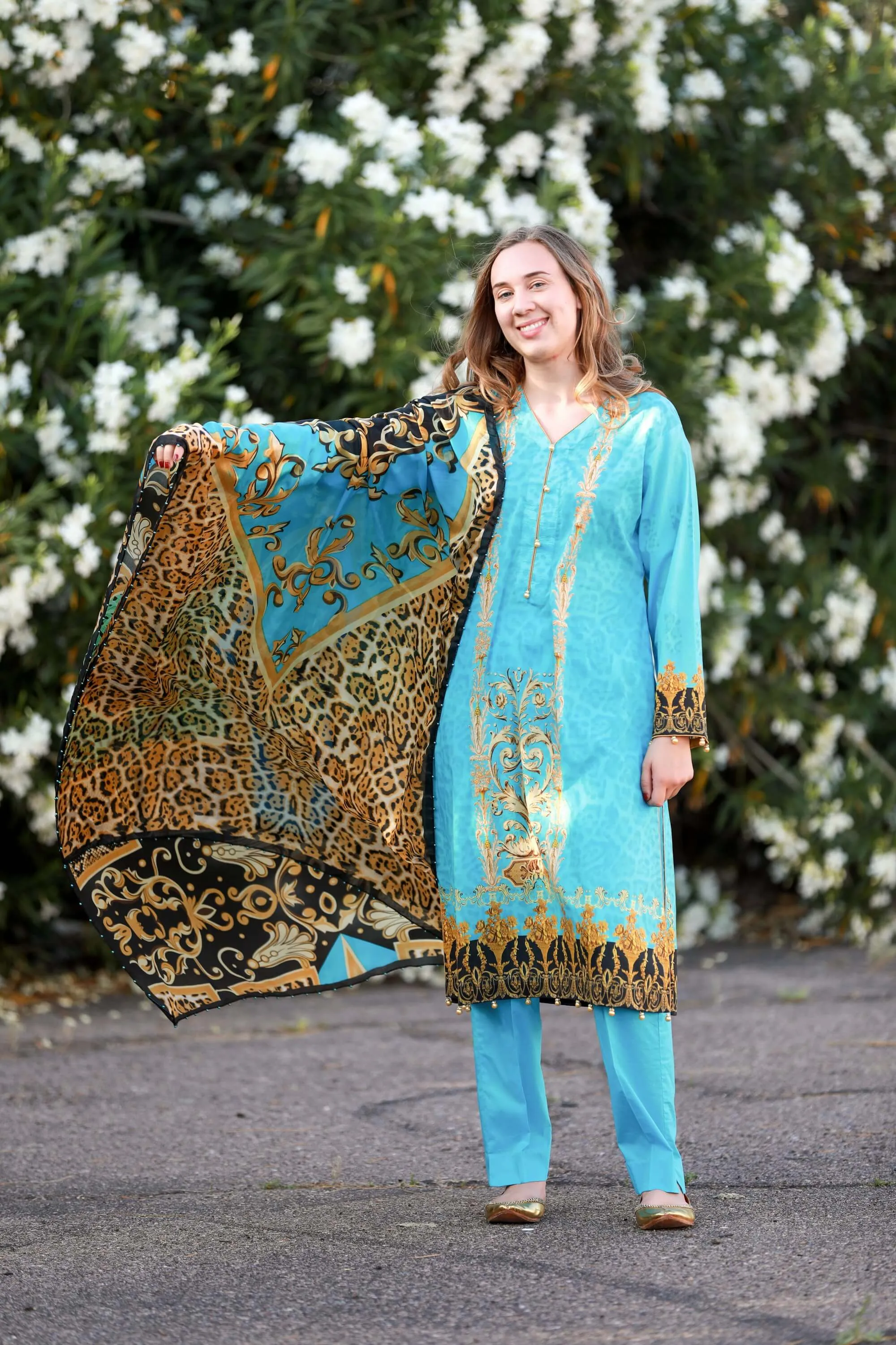 Turquoise Salwar Kameez With Print Design
