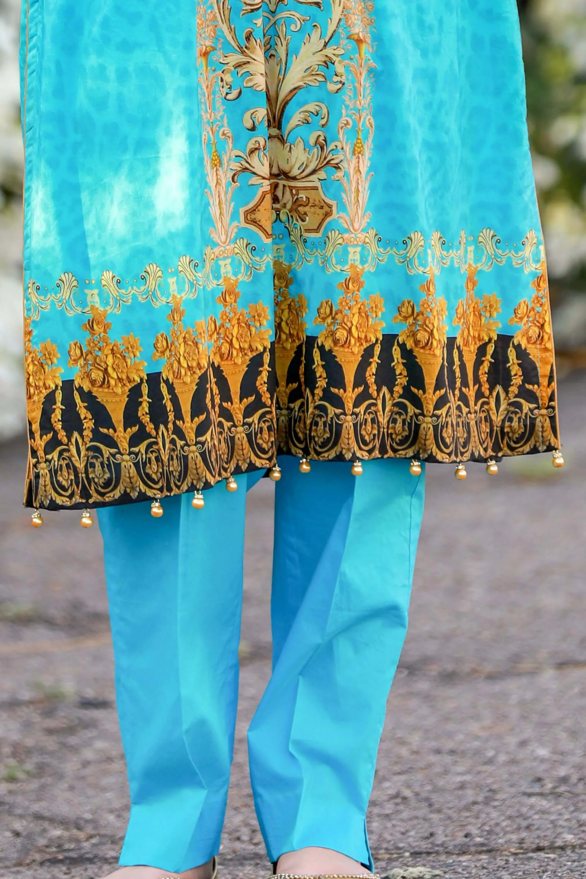 Turquoise Salwar Kameez With Print Design